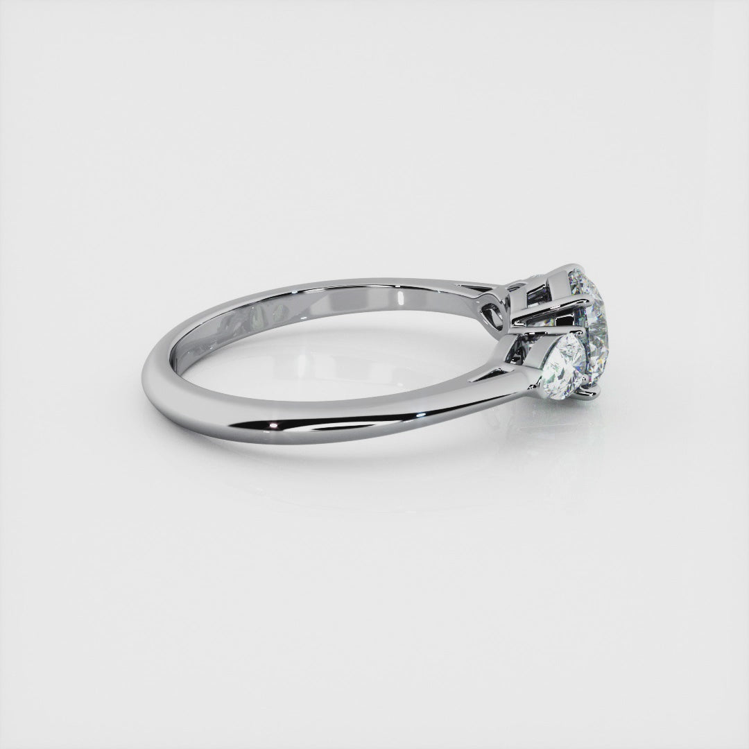 1.00 Carat Round Brilliant Shape With Pear Shape Side Stones Engagement Ring