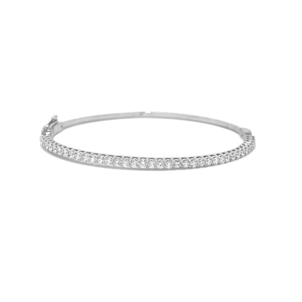 A stunning 14K white gold diamond bangle bracelet, adorned with 1.90ctw of brilliant diamonds, making it the perfect accessory for any occasion