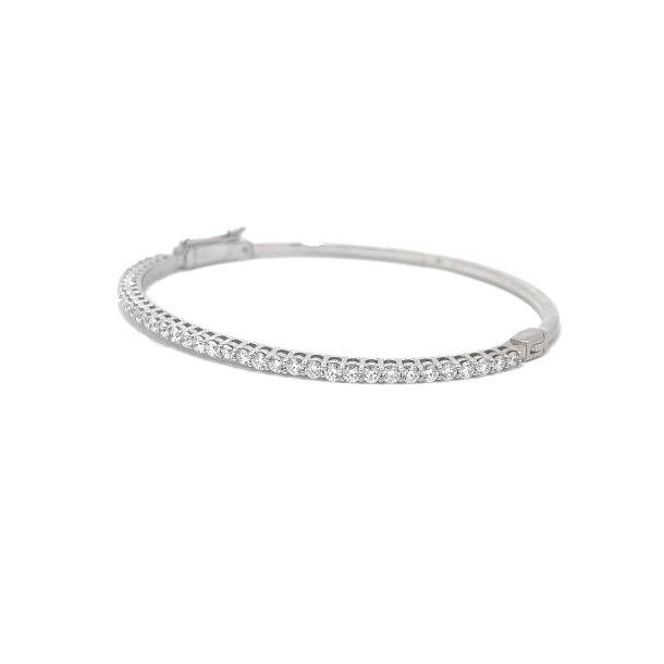 A stunning 14K white gold diamond bangle bracelet, adorned with 1.90ctw of brilliant diamonds, making it the perfect accessory for any occasion